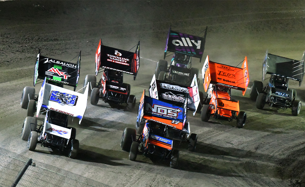 A group of World of Outlaws Sprint Cars take the green flag at Volusia Speedway Park